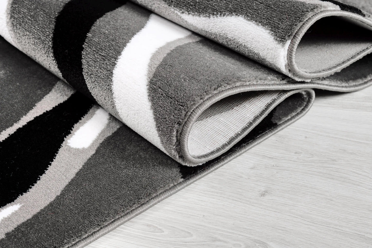 Calvin Grey Black Abstract Area Rug - Ladolerugsca