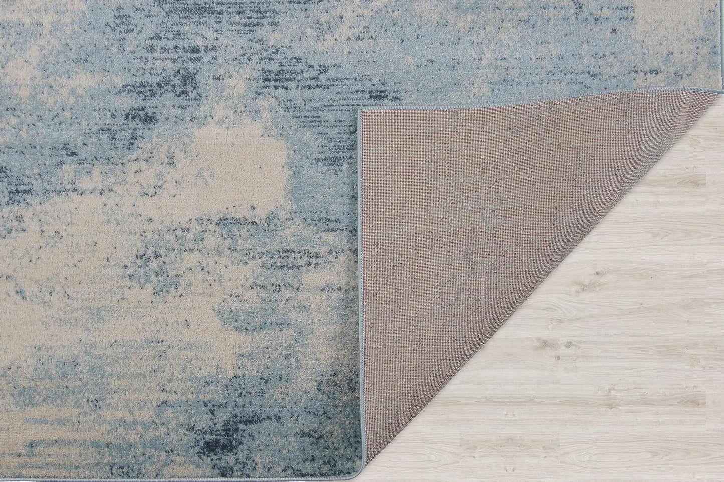 Unique Ivory Rustic Blue Area Rug